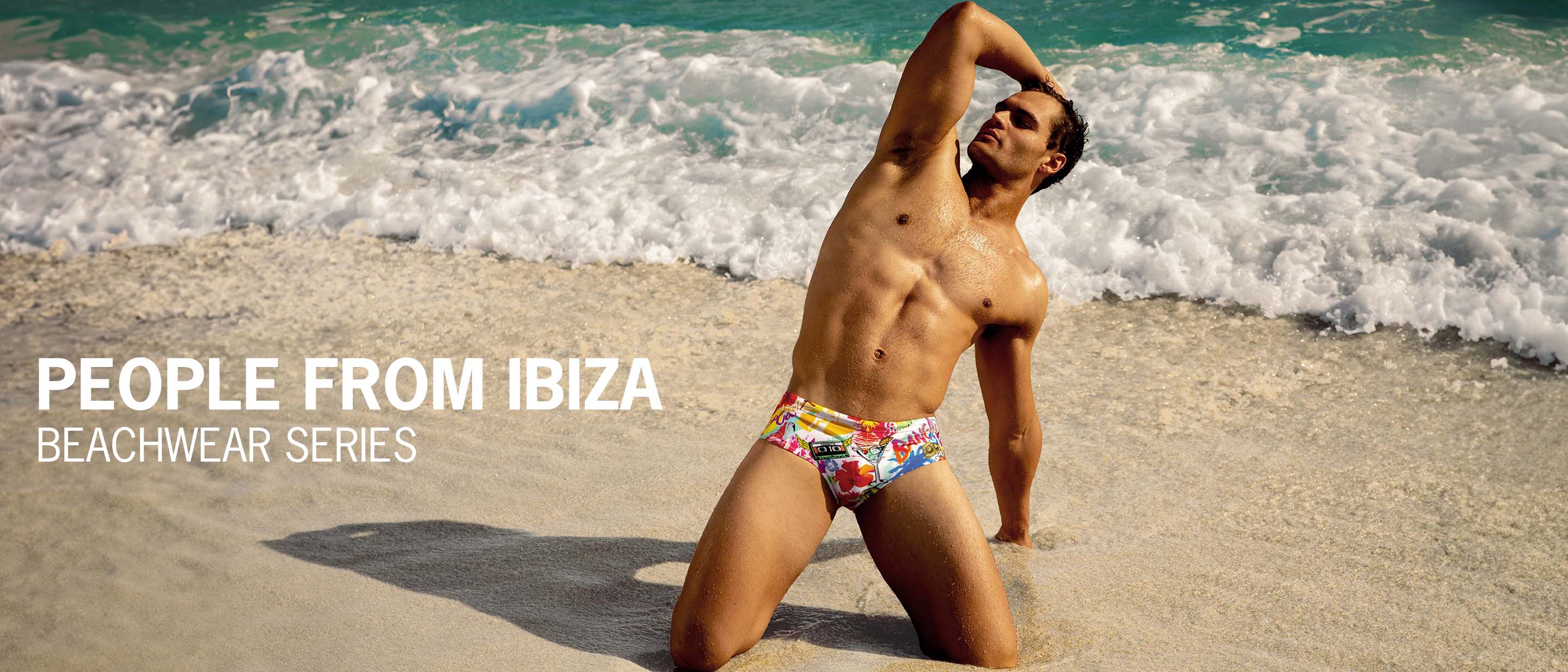 The People From Ibiza complete beachwear by BANG! Miami, featuring swimsuits and beach shorts for men with comics style print in bold colors with summer scenes, sun, cocktails, martinis, surf girls, beach parties, flamingos, starfish, boombox, Sandy Marton mix tapes, at Baleares islands.