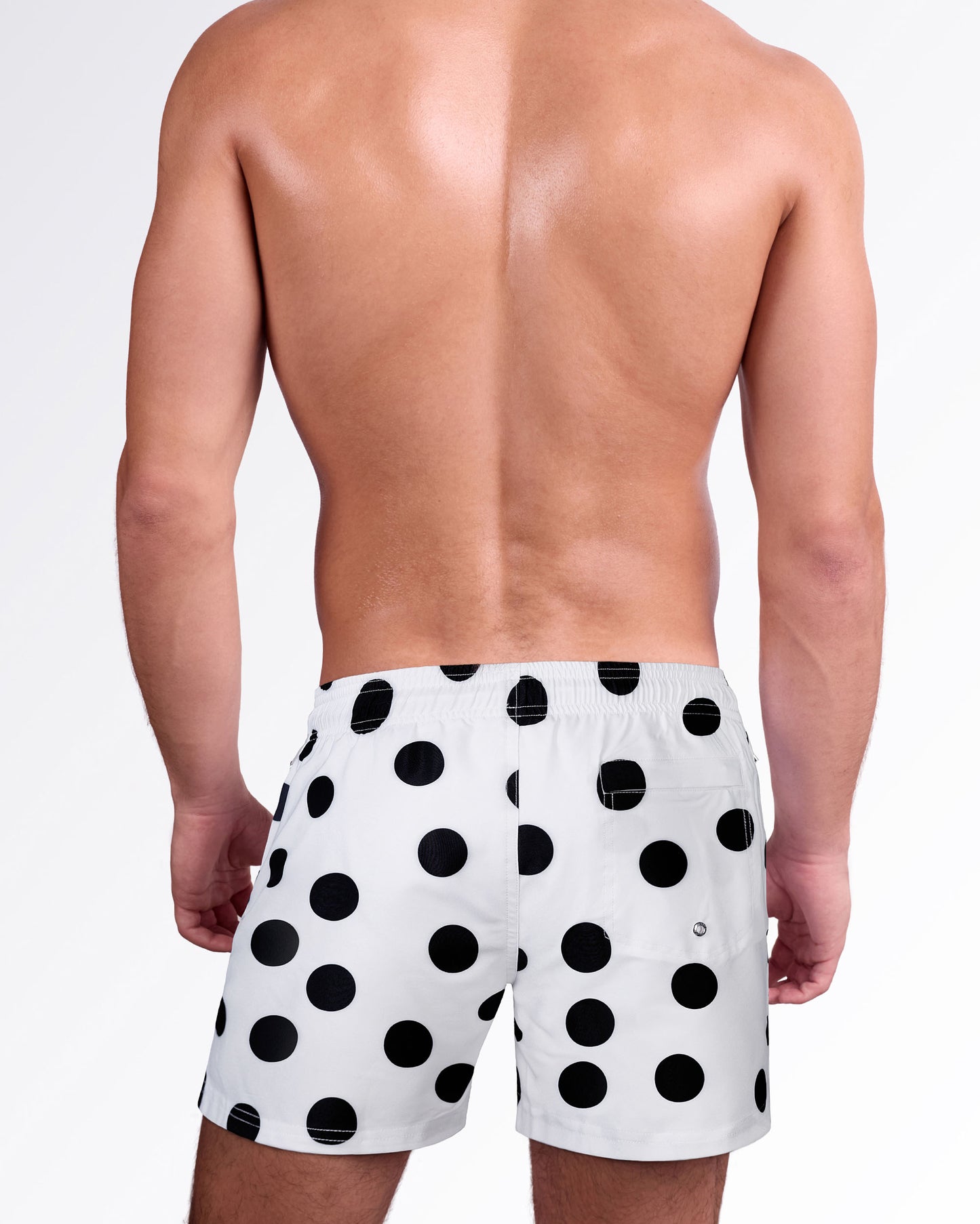 Back view of the Connect the Dots Resort Shorts showcasing the playful black polka dot print, comfortable elastic waistband, and rear pocket detail.