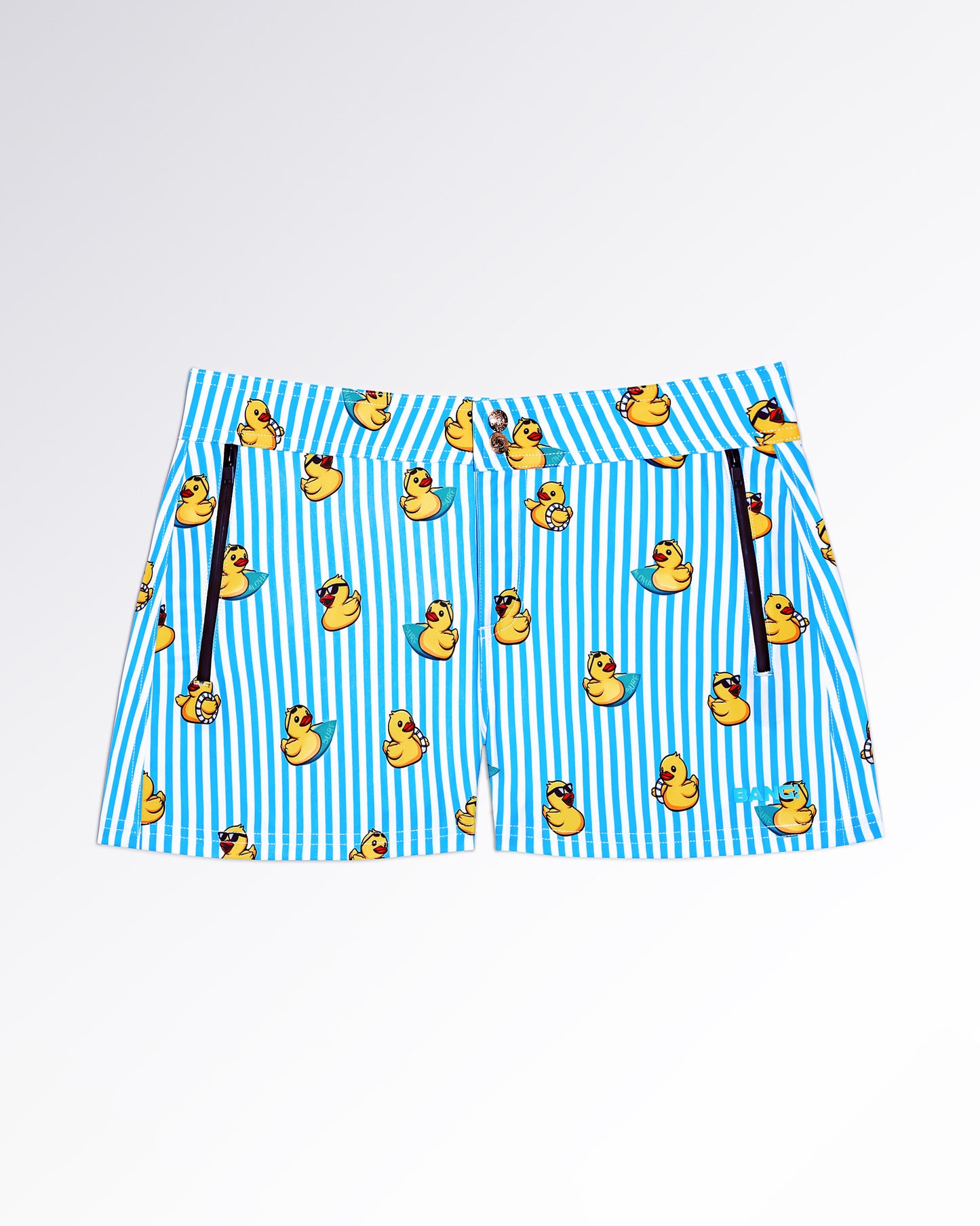 BANG! Miami Ducks Just Wanna Have Fun Beach Shorts — flat lay of blue and white striped beach shorts with playful yellow duck graphics in a fun poolside-inspired print.