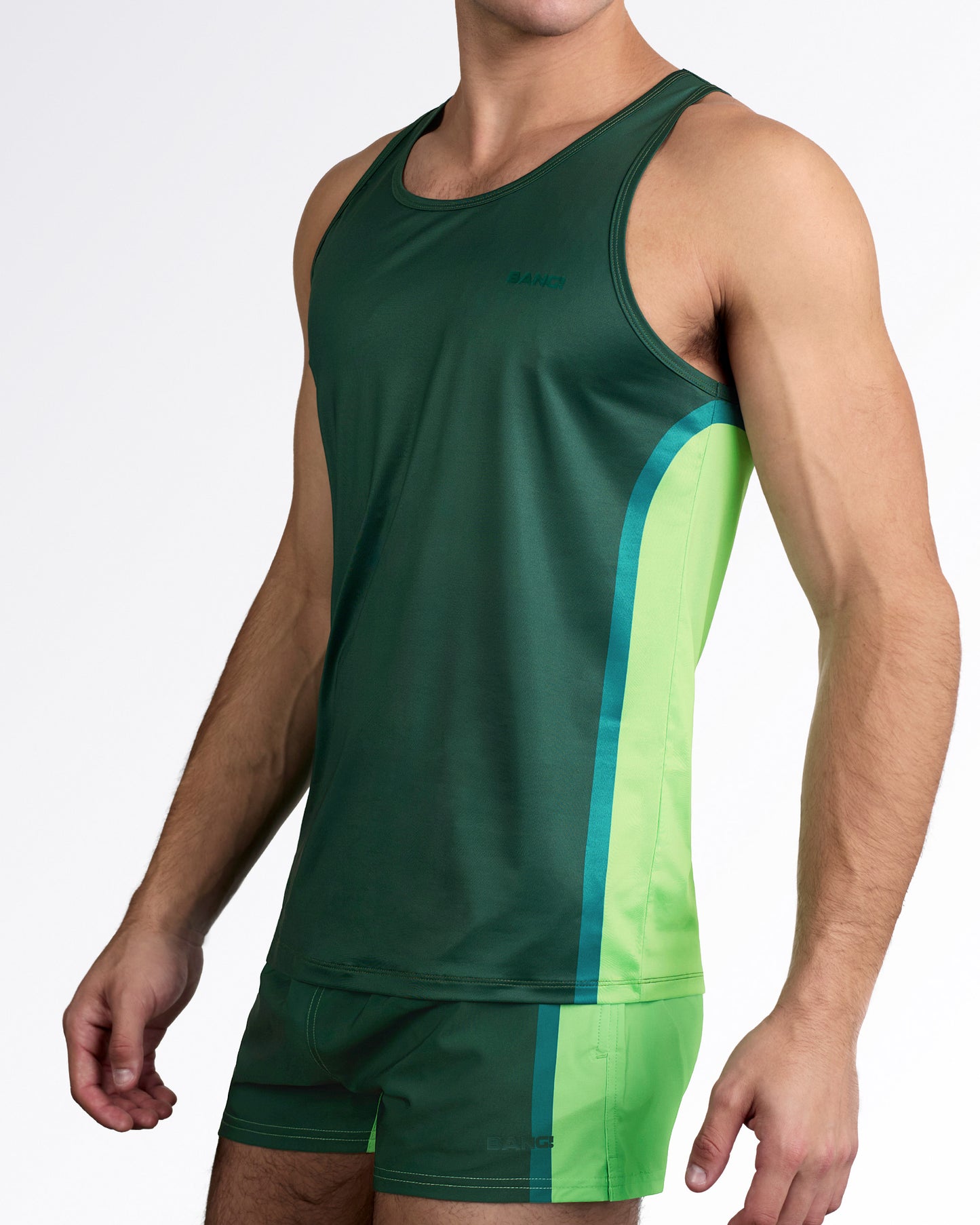 BANG Lines In Stereo Gym Tank Top — angled full body view styled with matching green performance shorts for a coordinated activewear set.