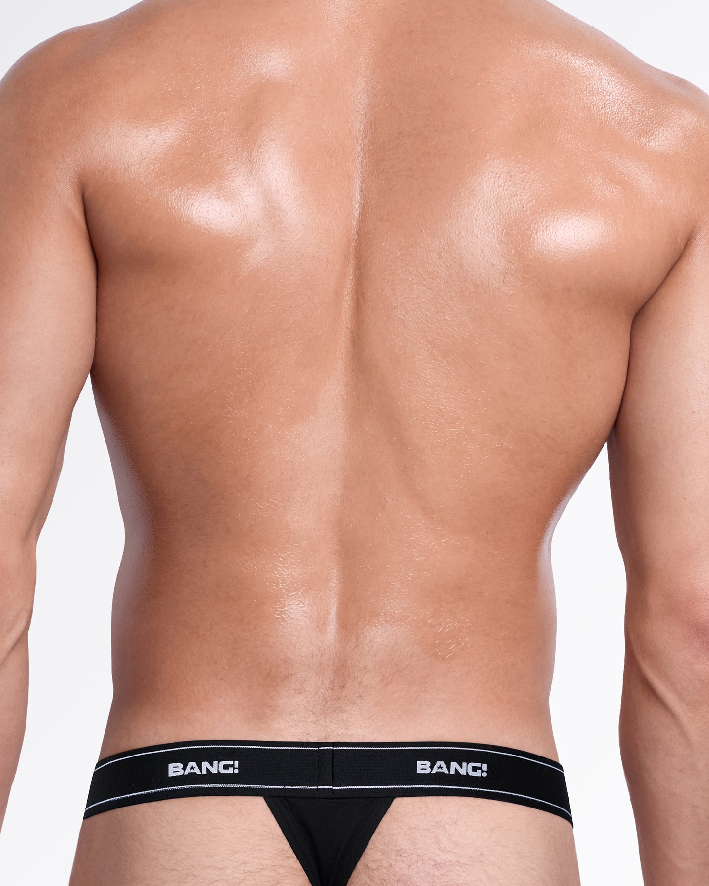 Back view of the Max Black men's cotton modal thong, highlighting the supportive T-back design, soft stretch fabric, and branded BANG! waistband.
