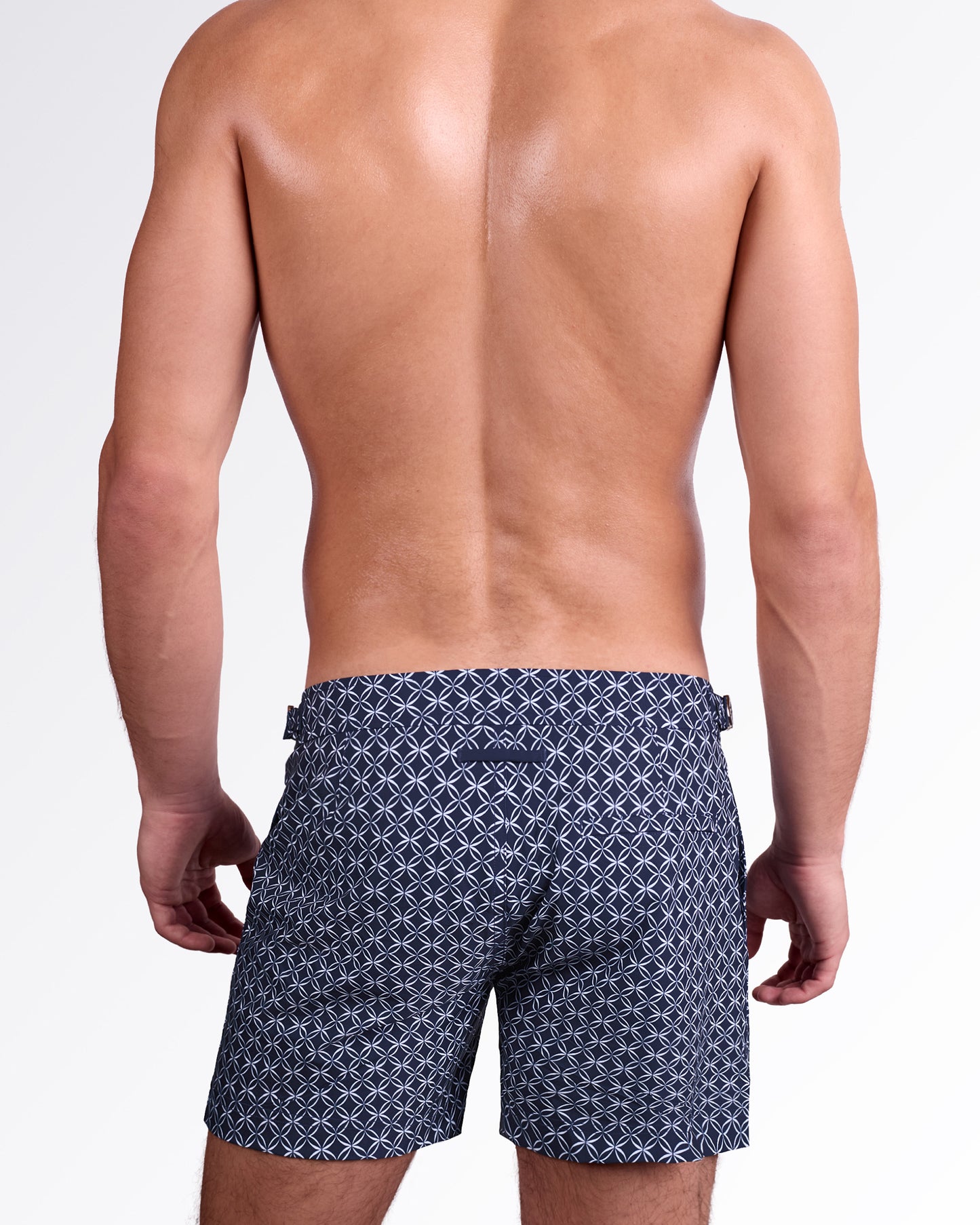 DC2 Miami Mono Waves Tailored Shorts — back view showing the blue geometric print, tailored silhouette, and rear welt pocket detail.
