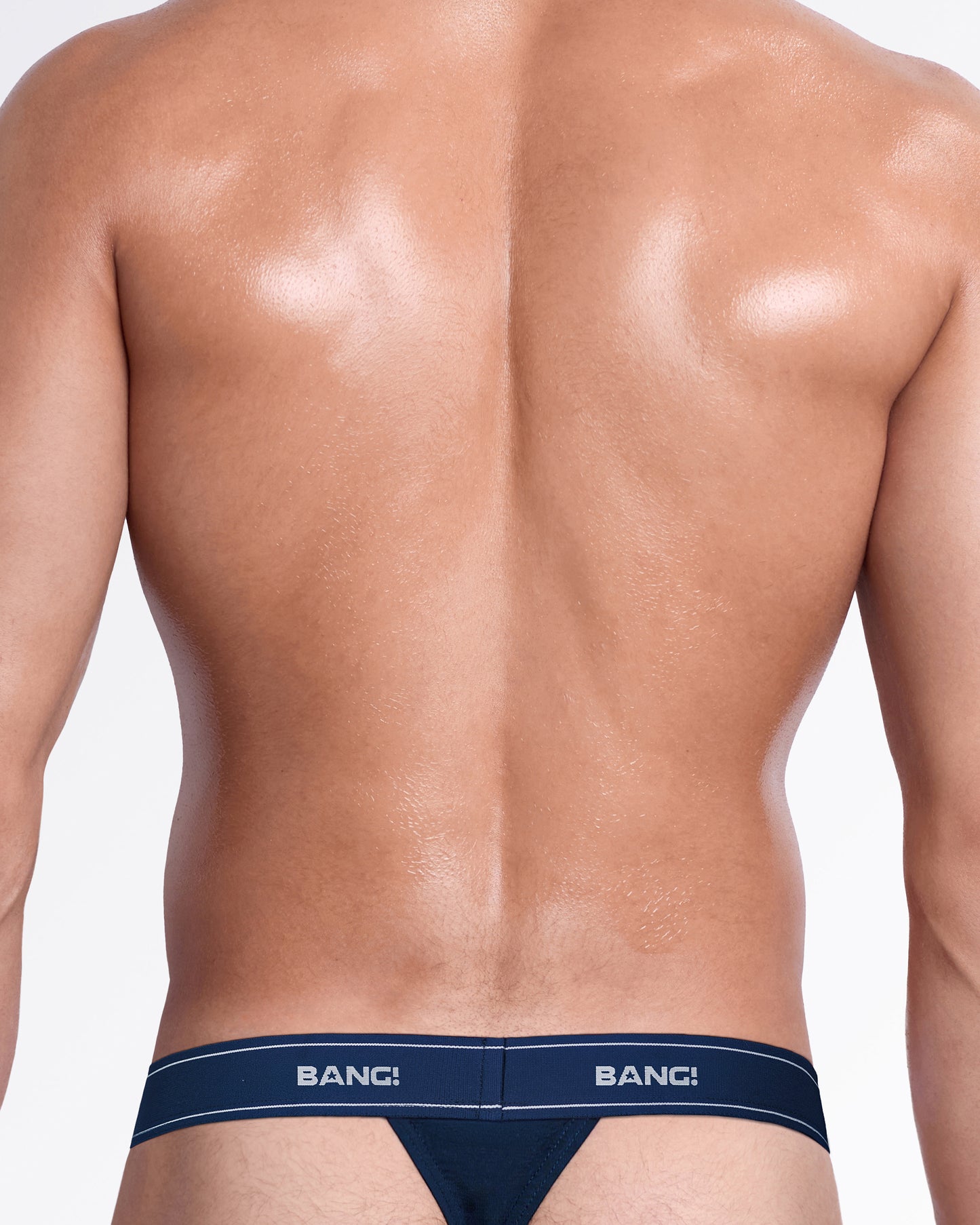Back view of the Navy Blue men's cotton modal thong, showcasing the sleek T-back design, soft stretch fabric, and signature BANG! elastic waistband.