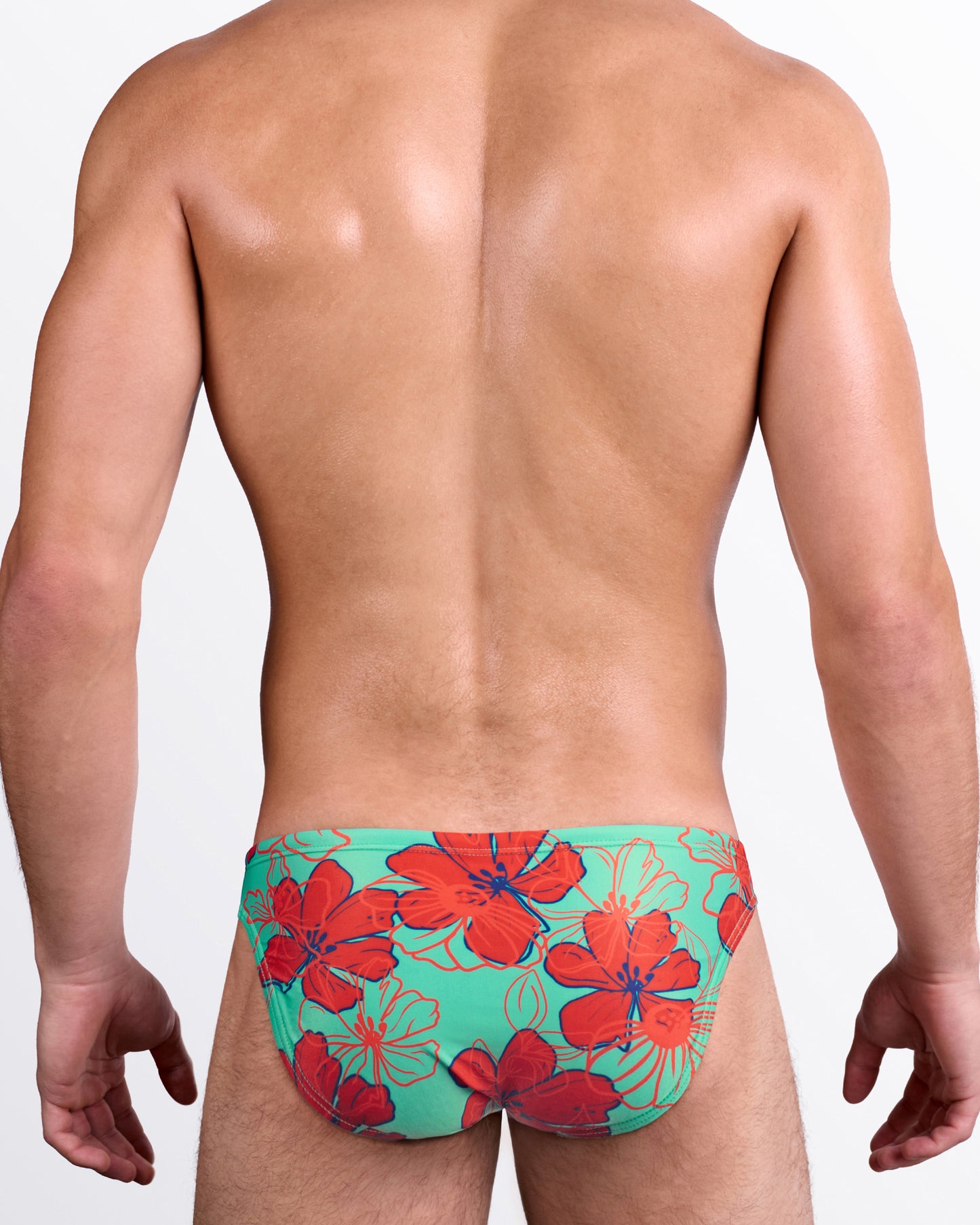 BANG Surf Flowers (Aqua/Red) Swim Mini Brief — back view showcasing full red hibiscus-style floral pattern on aqua background.