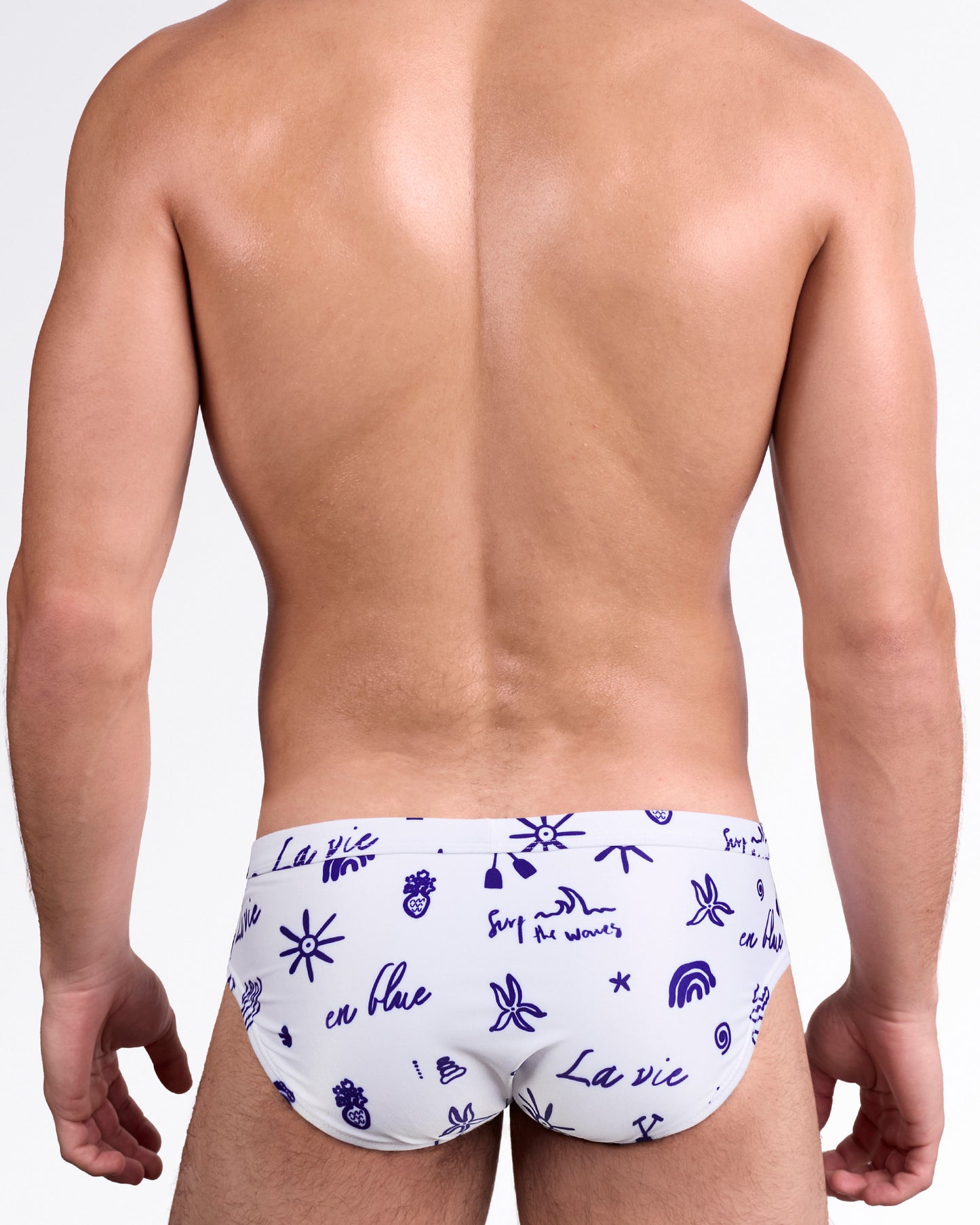 BANG! Viva La Vida (Blue) Swim Brief — back view showcasing allover blue icon print, smooth contour cut, and clean waistband finish.