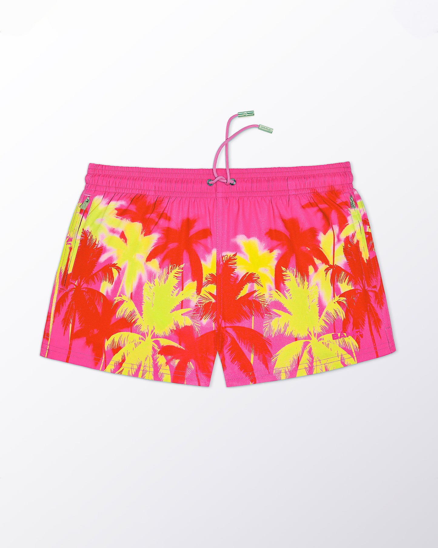 BANG! Miami Wuthering Heights (Fucsia) Show Shorts — flat lay of neon pink show shorts with vibrant yellow palm tree print and tropical-inspired design.