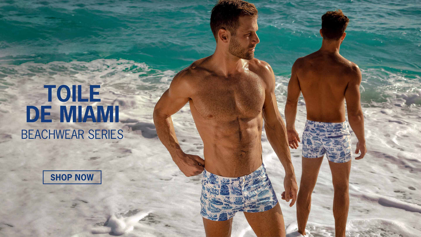 The Toile de Miami Beachwear Series featuring repeated monchromatic patterns of Art Deco architecture, hotels, Dolphins, flamingos, lifeguard towers and other iconic motifs of south beach the 'French Riviera' of South Florida.