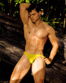 Male model wearing the KOKOMO YELLOW Swim Mini Brief a bright yellow color by BANG! Clothes is the official Miami swimwear brand for men. 