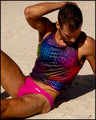 Male model wearing the CONFESSIONS ON A SAND FLOOR Tank Top and the CONFESS MAGENTA Swim Mini-Brief by BANG! Clothes the official brand of men’s swimwear brand based in Miami, FL.