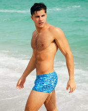 Male model wearing the new WET print series for Spring/Summer 2024 from the new DC2 capsule-brand by BANG! Miami.