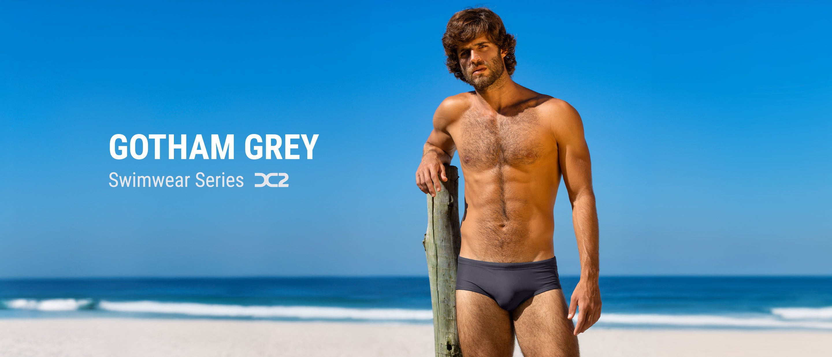 The GOTHAM GREY men's swimsuit series in dark grey taupe sepia color. From the DC2 swimwear brand by BANG! Miami. Available as swim brief, swim sungas, swim shorts and  square cut swim trunks.