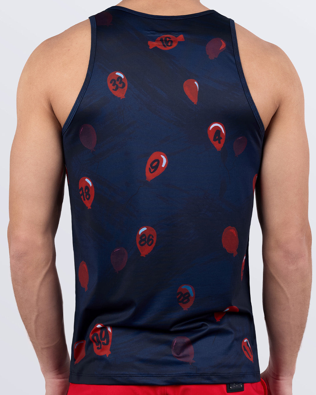 Back view of 99 RED BALLOONS men’s tank top – dark blue with red numbered balloon graphics – lightweight and moisture-wicking fitness wear