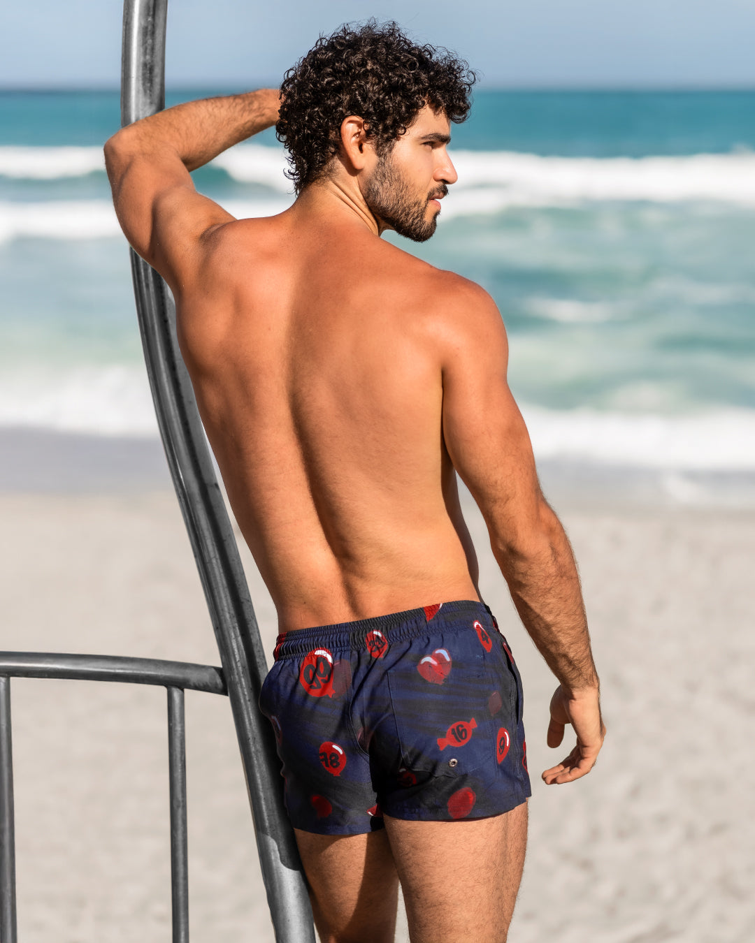 DC2 99 Red Balloons Poolside Shorts — navy swim shorts featuring vibrant red balloon prints, quick-dry fabric, adjustable drawstring waist, and a tailored mid-length fit.