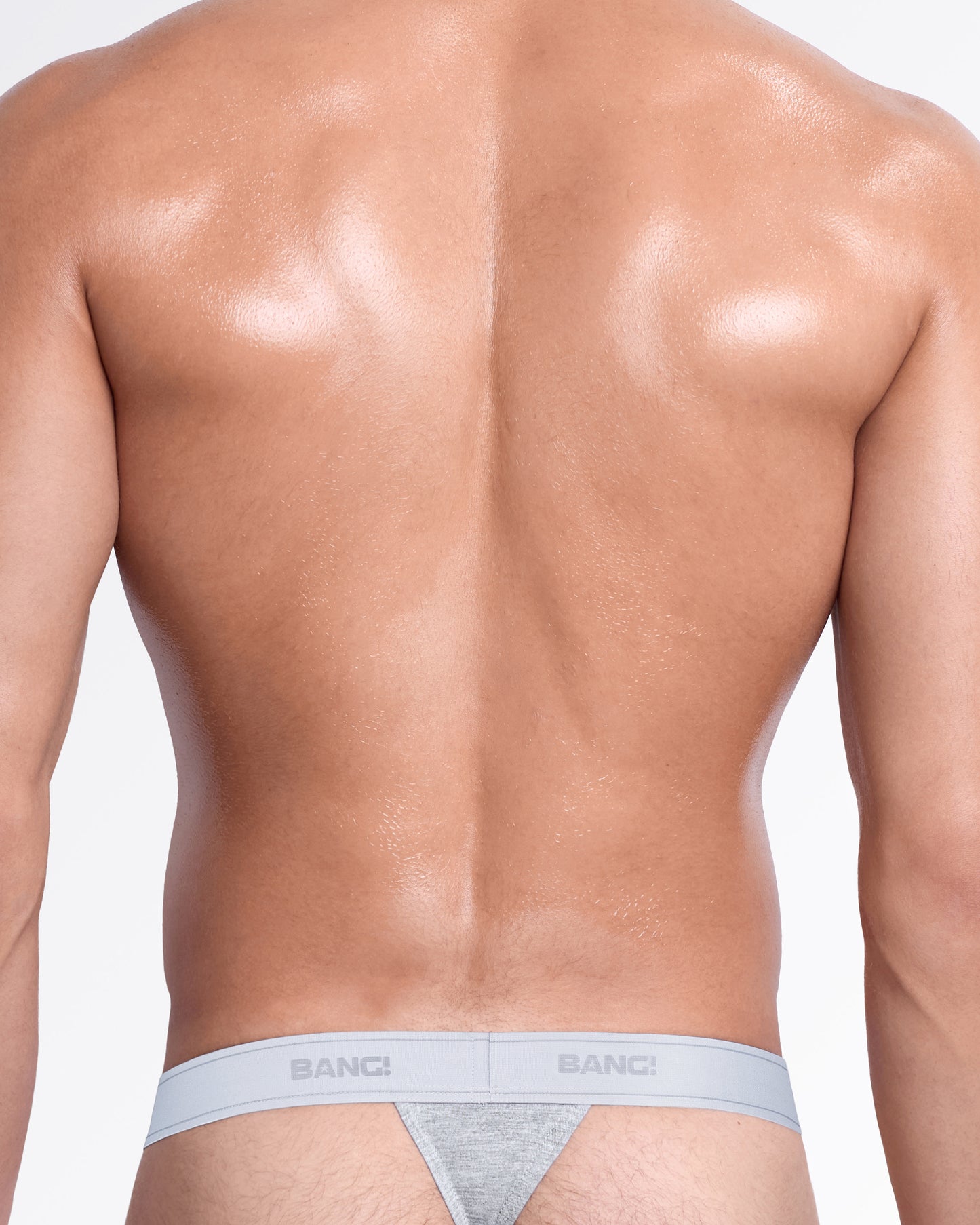 Back view of the Amazing Gray men's cotton modal thong, showcasing the sleek T-back silhouette, ultra-soft stretch fabric, and tonal BANG! elastic waistband.