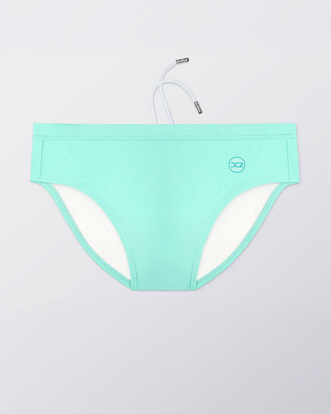 Flat lay of the DC2 Aqua Lite Swim Brief, featuring a fresh aqua tone and sleek, sculpted swim brief design.