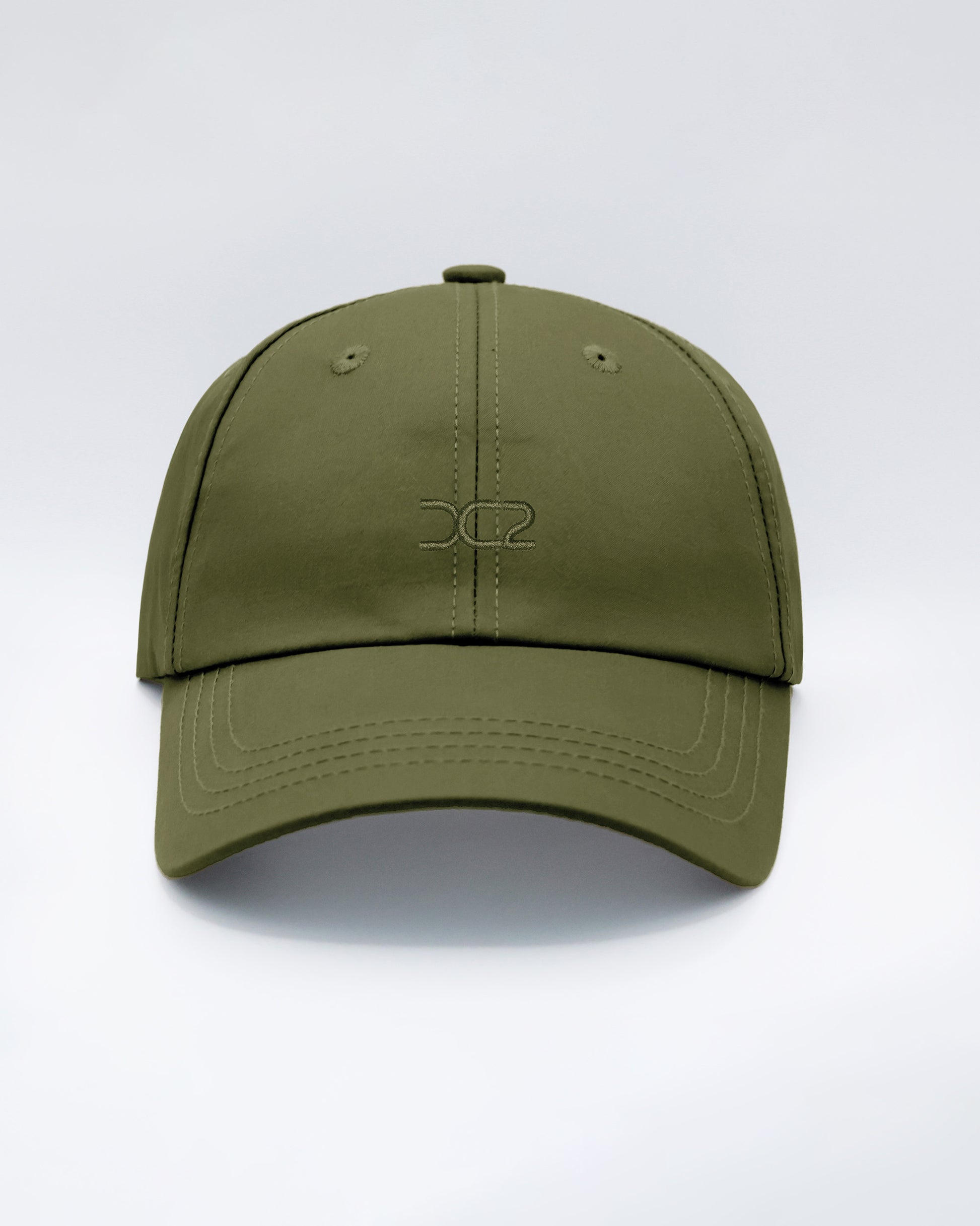 DC2 Resort Cap in Army Green — front view showcasing a curved brim, structured crown, and tonal embroidered DC2 logo.