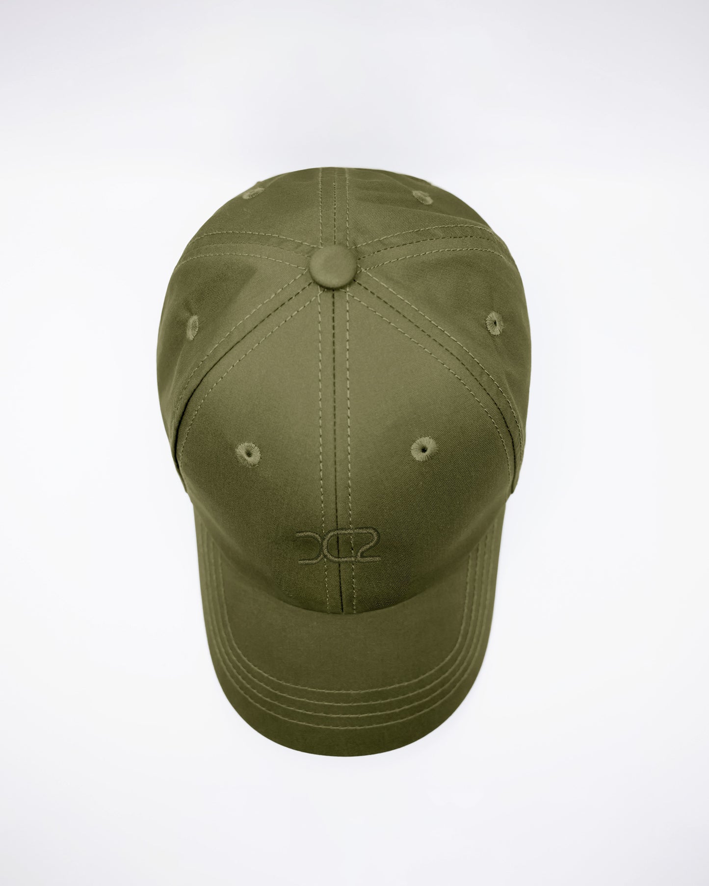 DC2 Army Green Resort Cap — top view highlighting the six-panel construction, stitched seams, and breathable eyelets.