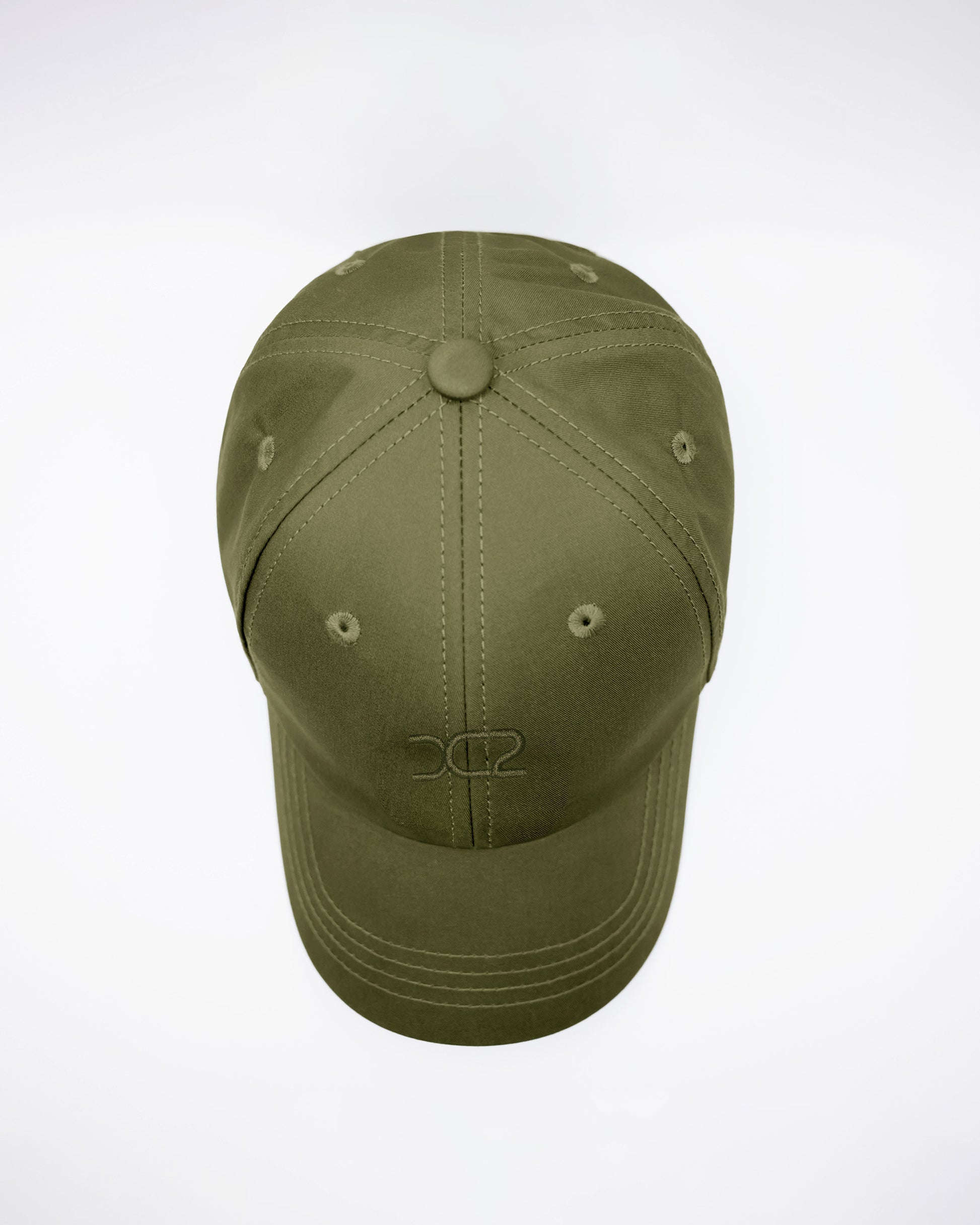 DC2 Army Green Resort Cap — top view highlighting the six-panel construction, stitched seams, and breathable eyelets.