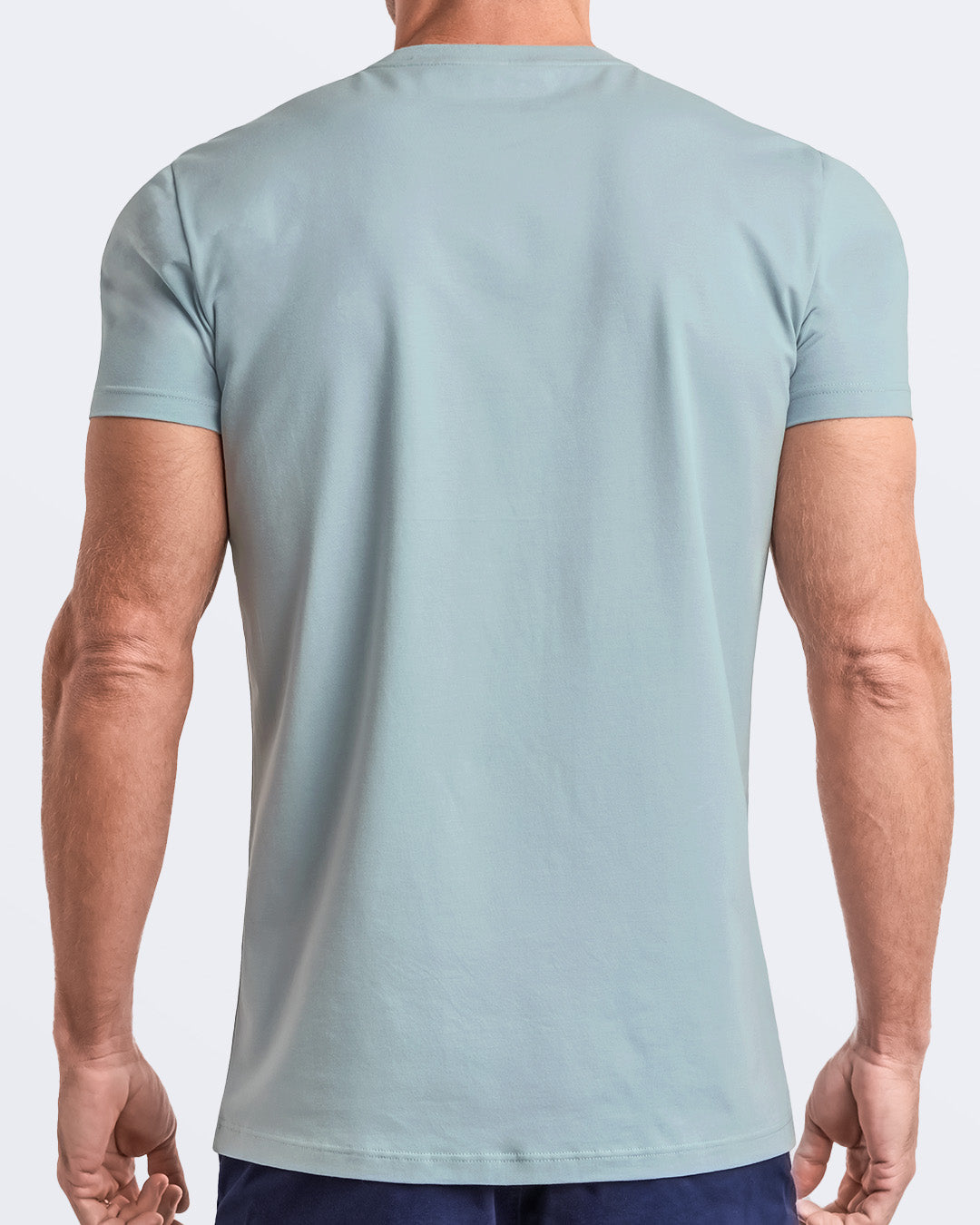 Back view of a pale light teal men's t-shirt, made from soft, durable and breathable modal cotton. Part of the DC2 Miami men's streetwear and beachwear collection, ideal for casual summer outfits