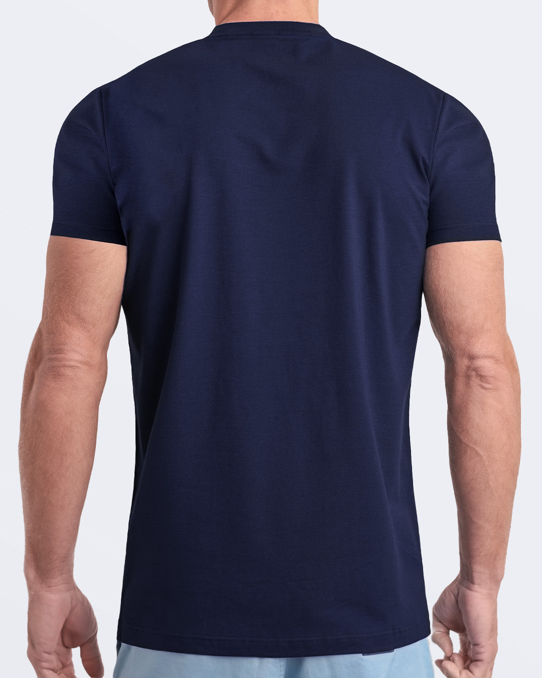 Back view of a navy blue men's t-shir, made from soft, durable and breathable modal cotton. Part of the DC2 Miami men's streetwear and beachwear collection, ideal for casual summer outfits.