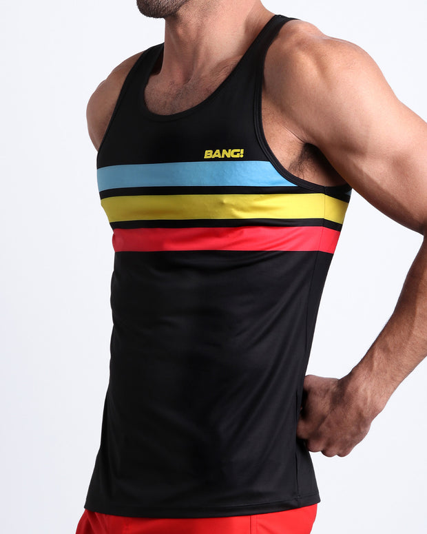 Side view of model wearing the BIONIC Stripes men’s tank top by the Bang! brand of men&