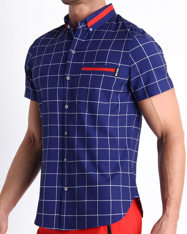 Side view of the BJORN AGAIN (BLUE) men’s Summer button down in navy dark blue in remixed concept inspired by iconic P.L. Rolando&
