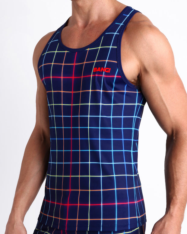 Side view of men’s casual tank top in BJORN THIS WAY (DARK) in dark blue with color stripes in red, orange, blue, green made by Miami based Bang brand of men&
