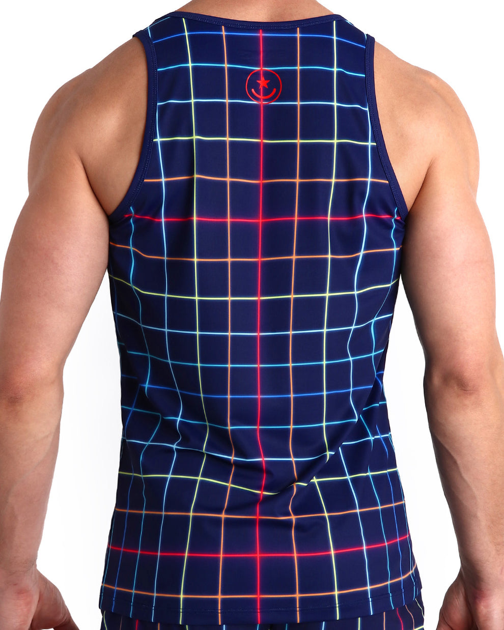Back view of male model wearing the BJORN THIS WAY (BLACK) summer tank top for men by BANG! Miami in navy blue color featuring multi color, red, blue, green and orange stripes.