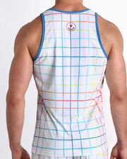 Back view of male model wearing the BJORN THIS WAY summer tank top for men by BANG! Miami featuring multi color, red, blue, green, yellow and orange stripes.