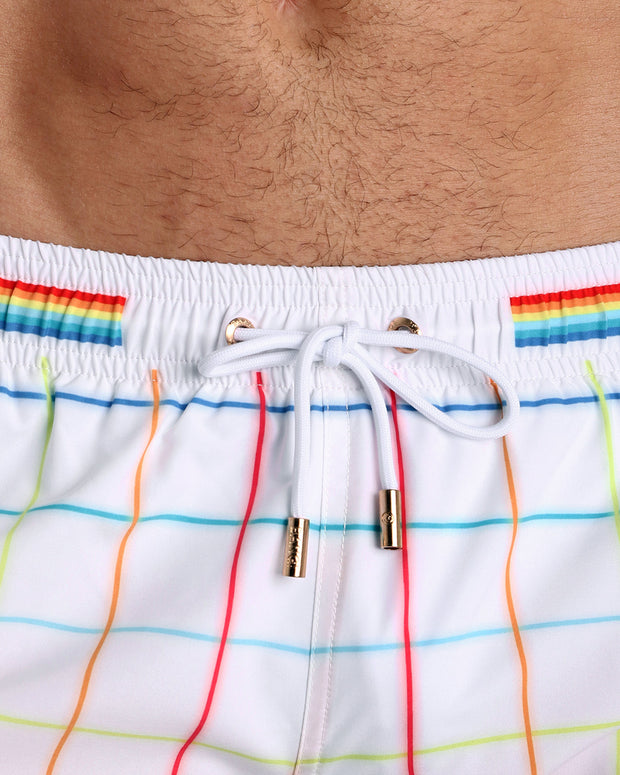 Close-up view of the BJORN THIS WAY (LIGHT) men’s summer shorts, showing white cord with custom branded golden cord ends, and matching custom eyelet trims in gold.