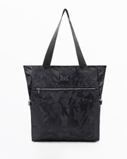 The BLACK CAMO Poolside Tote Bag by DC2 Miami, features a bold black camouflage design. This bag is a perfect companion for beach outings, shopping trips, or everyday use.