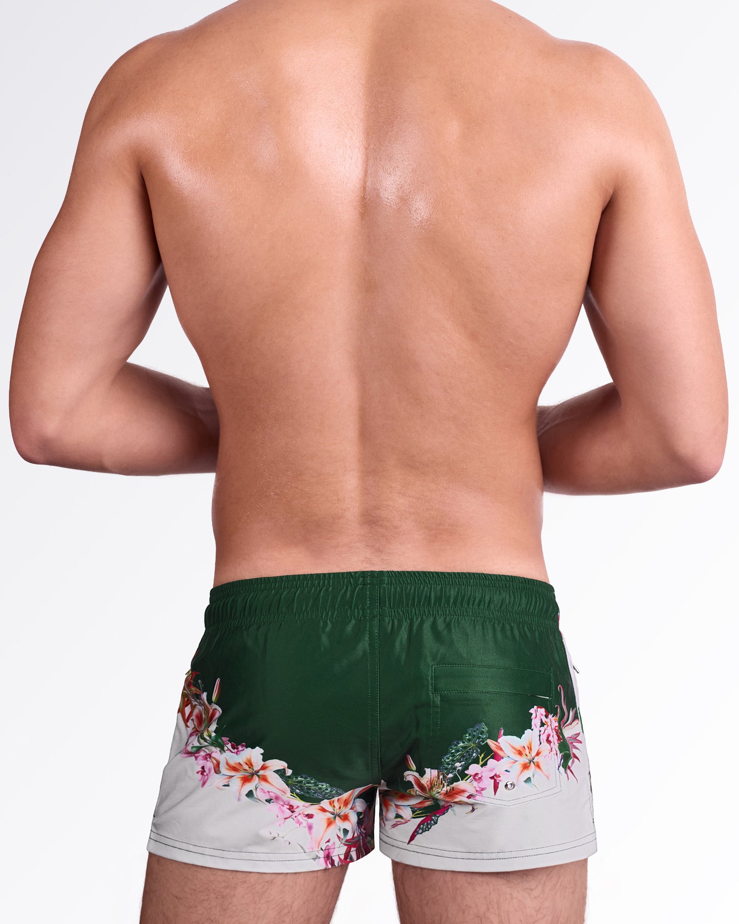 DC2 Bloom Service Poolside Shorts — back view showcasing the floral print wrapping across the lower back of the shorts along with the rear pocket design.