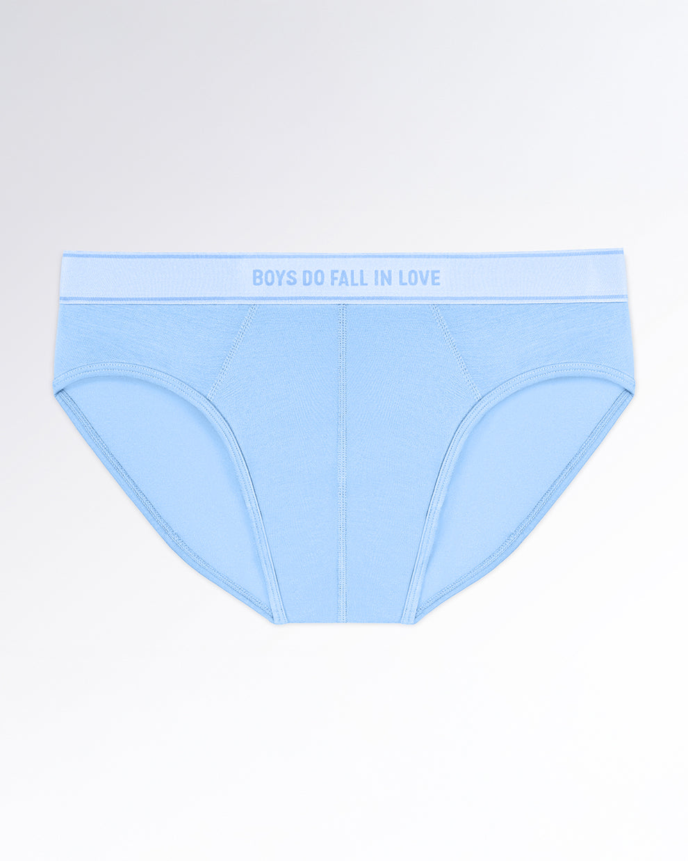 BOYS DO FALL IN LOVE Modal Briefs — flatlay of light blue men’s modal briefs with soft contour stitching and a matching elastic waistband featuring tonal text.