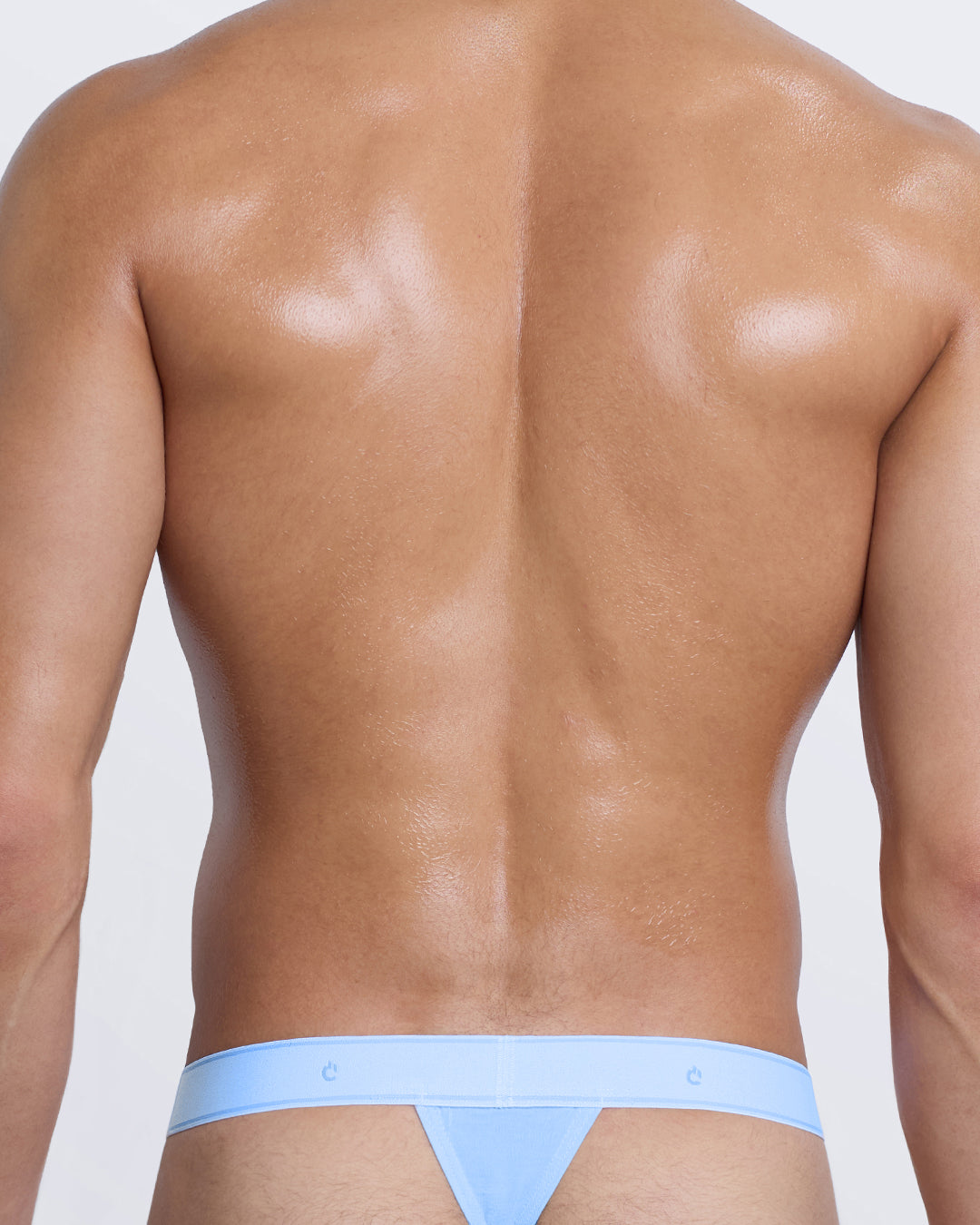 Back view of DC2 light blue modal thong — minimal coverage with comfortable waistband fit.