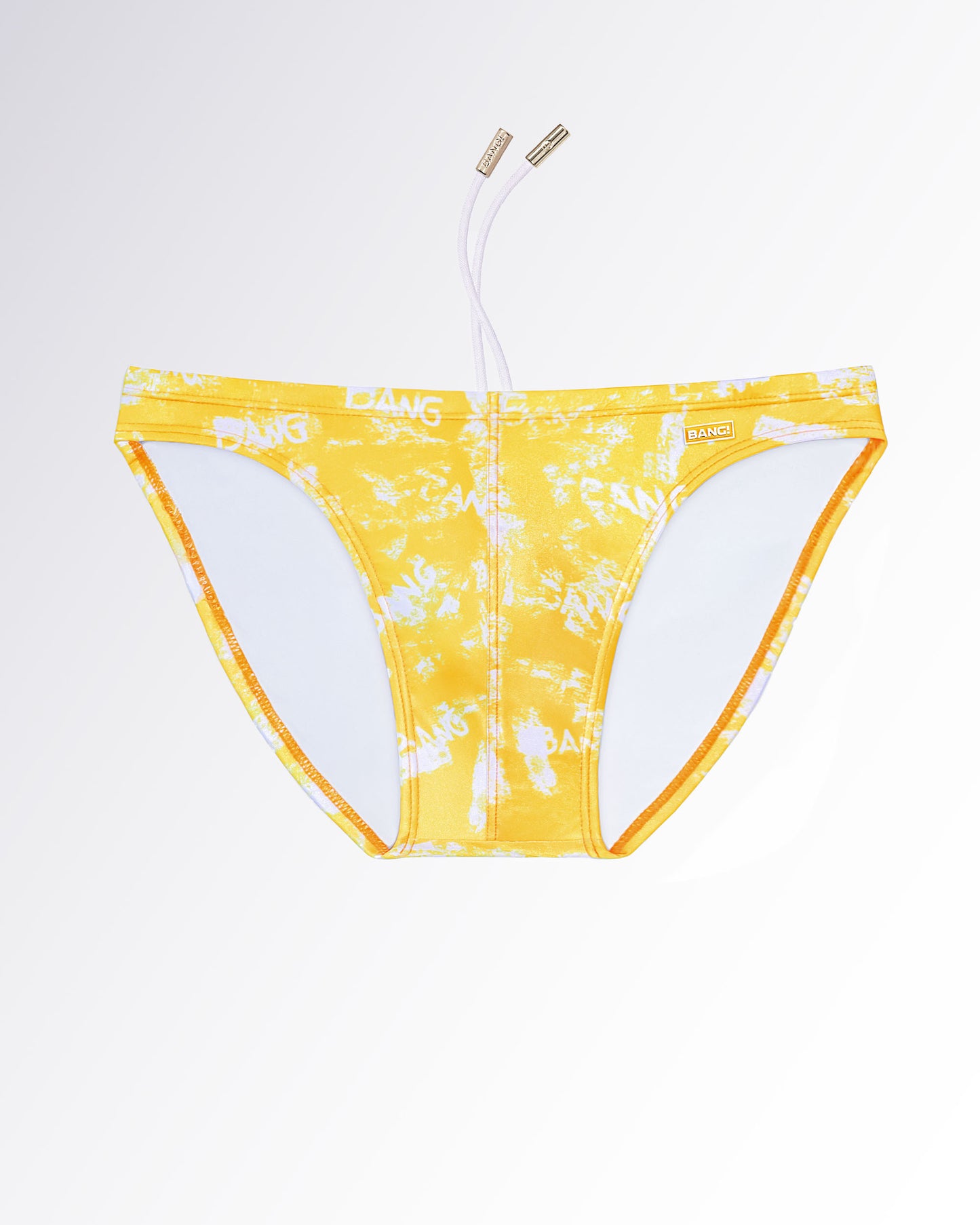 BANG! Miami Brush Rush (Yellow) Swim Mini Brief — flat lay of yellow swim mini briefs with abstract white brushstroke print and minimal side strap silhouette.