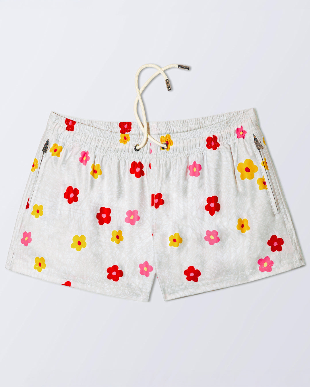 DC2 BUY MYSELF FLOWERS Poolside Shorts – front view with bold red, pink, and yellow floral print.