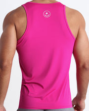 Back view of the CONFESS MAGENTA men's fitness tank top in a hot pink color by BANG! menswear Miami.