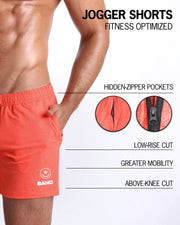 The BANG! PUMPED ORANGE Jogger Shorts - designed with sweat-wicking fabric to keep you cool and dry, hidden zipper pockets to keep your essentials safe, a low-rise cut for a comfortable fit, and an above-knee length for maximum mobility. 