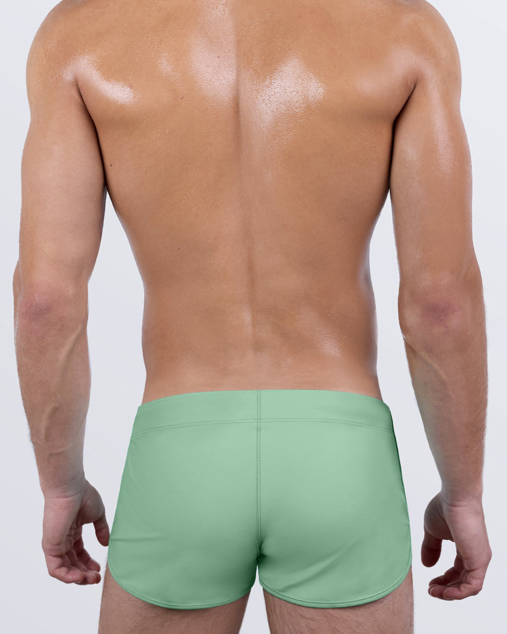 DC2 Cabana Green Swim Shorts — back view showing form-fitting silhouette and contoured cut for a sculpted look.