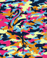 A flamingo in bright pink, orange, navy, blue, and pale yellow pops out from the CAMO POP print, adding a colorful twist to the classic camouflage pattern.