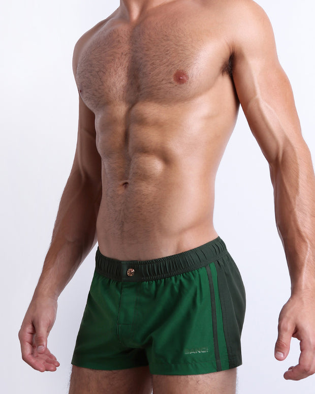 Side view of the CASINO ROYALE (GREEN) for men’s summer Mini Shorts with dual pockets. Inspired by actor Daniel Craig&