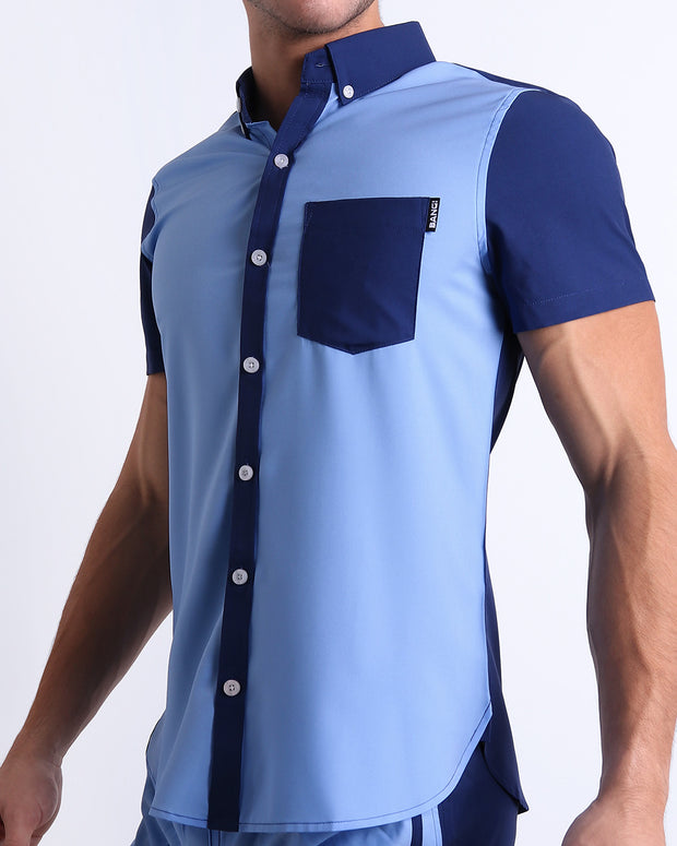 Side view of the CASINO ROYALE (BLUE) men’s Summer button-down in dual-tone split dark blue and light blue color. Inspired by actor Daniel Craig&