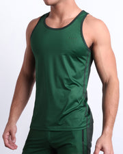 Side view of the CASINO ROYALE (GREEN) for men’s summer casual Tank Top in a color-block green color. Inspired by actor Daniel Craig's iconic blue swim trunks worn in the 2006 film Casino Royale, this top was designed by BANG! Clothes in Miami.