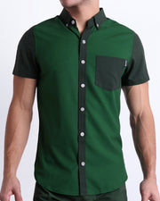 Front view of the CASINO ROYALE (GREEN) men’s sleeveless stretch shirt in color-block green colors. Inspired by actor Daniel Craig's iconic blue swim trunks worn in the 2006 film Casino Royale, this shirt was designed by BANG! Clothes in Miami.