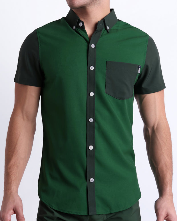 Front view of the CASINO ROYALE (GREEN) men’s sleeveless stretch shirt in color-block green colors. Inspired by actor Daniel Craig&
