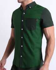 Side view of the CASINO ROYALE (GREEN) men’s Summer button-down in dual-tone split green color. Inspired by actor Daniel Craig's iconic blue swim trunks worn in the 2006 film Casino Royale, is designed by BANG! Clothes in Miami.