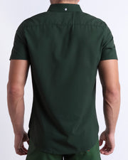 The back side of the CASINO ROYALE (GREEN) stretch shirt for men with a stylish color block design in dark green and light green for men. This high-quality button-up shirt is by BANG! Clothes, a men’s beachwear brand from Miami. Inspired by the iconic style of Daniel Craig's blue swim trunks in the 2006 film Casino Royale.
