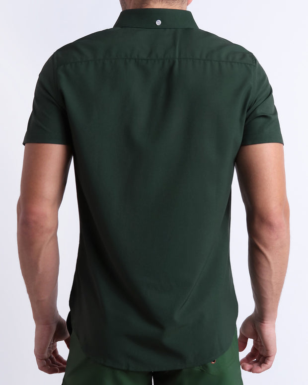 The back side of the CASINO ROYALE (GREEN) stretch shirt for men with a stylish color block design in dark green and light green for men. This high-quality button-up shirt is by BANG! Clothes, a men’s beachwear brand from Miami. Inspired by the iconic style of Daniel Craig&
