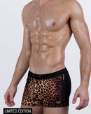 Side front view of the CASINO ROYALE Swim Trunks in Leopard + Black – fierce animal print front panel paired with sleek black sides and waistband.
