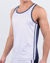  Men's athletic tank top in CASINO ROYALE (WHITE + NAVY BLUE) – a white color with navy blue side panels by BANG! Miami. A tank for gym, fitness training, running, or beachwear.